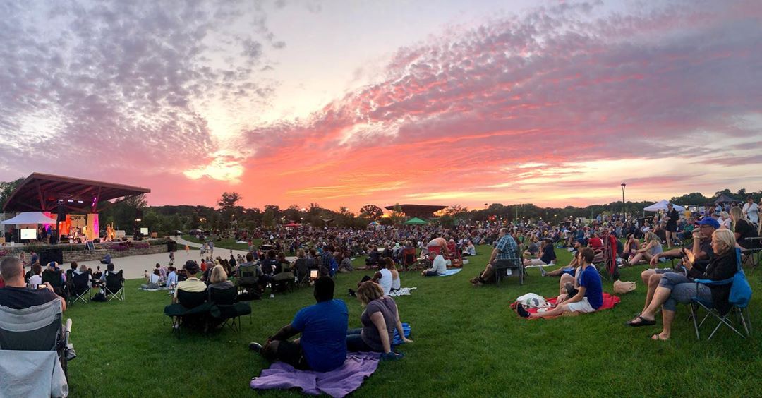 Wauwatosa's Tosa Tonight sunset with live music on the stage and sunset in the background