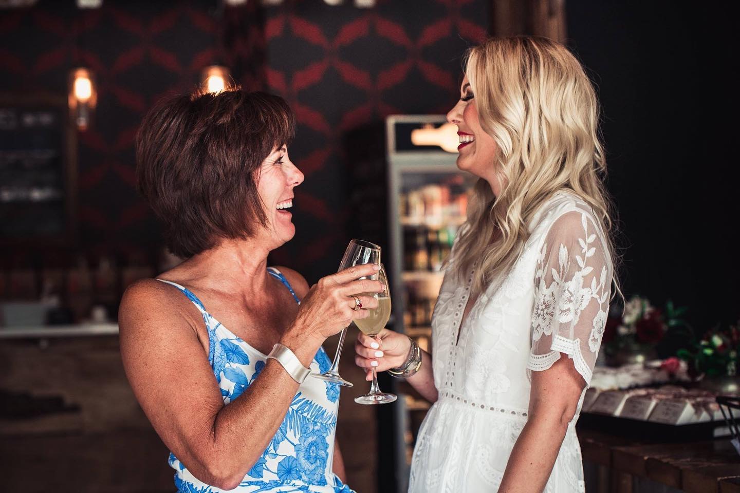 Two people enjoying glasses of wine at The Ruby Tap