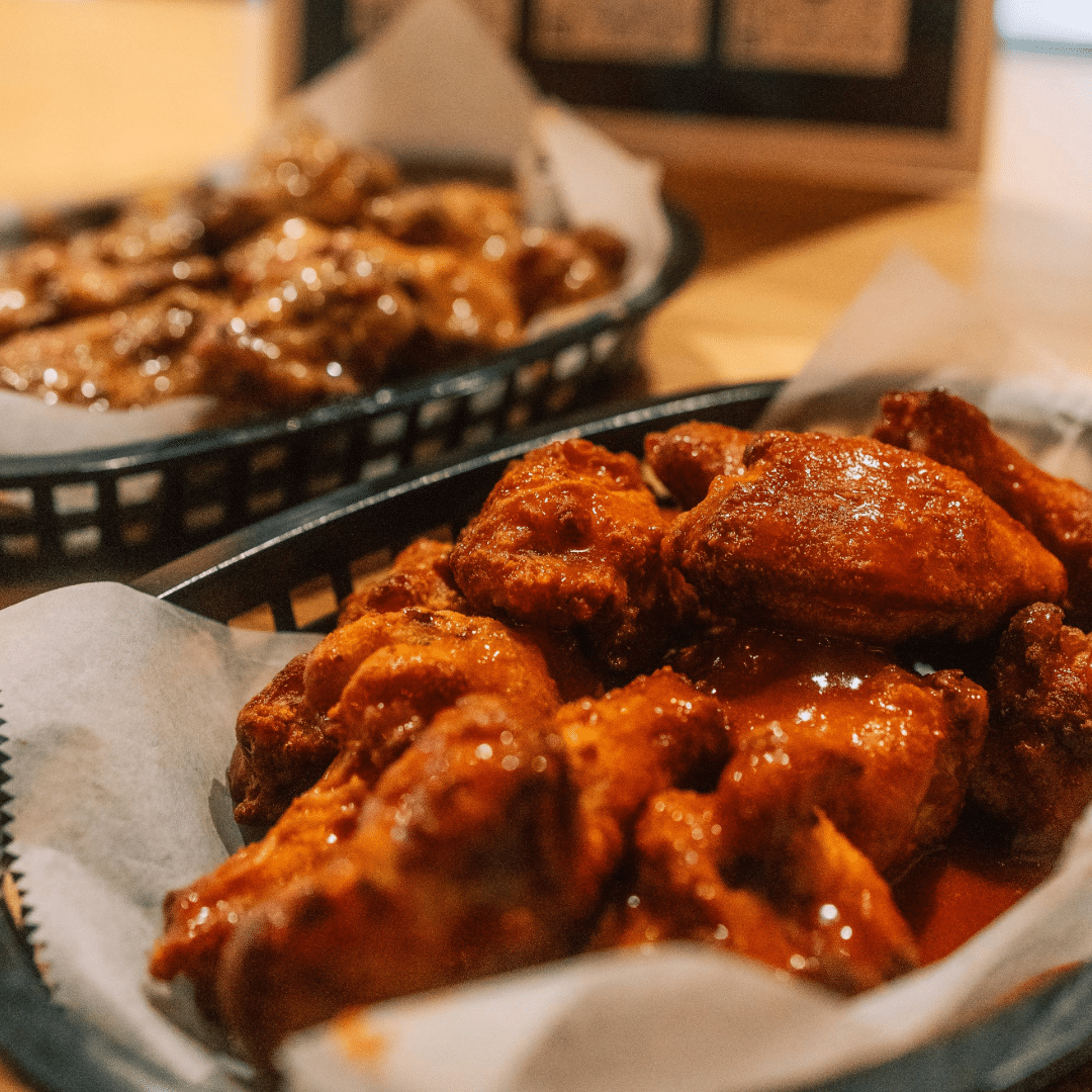 a basket of chicken wings