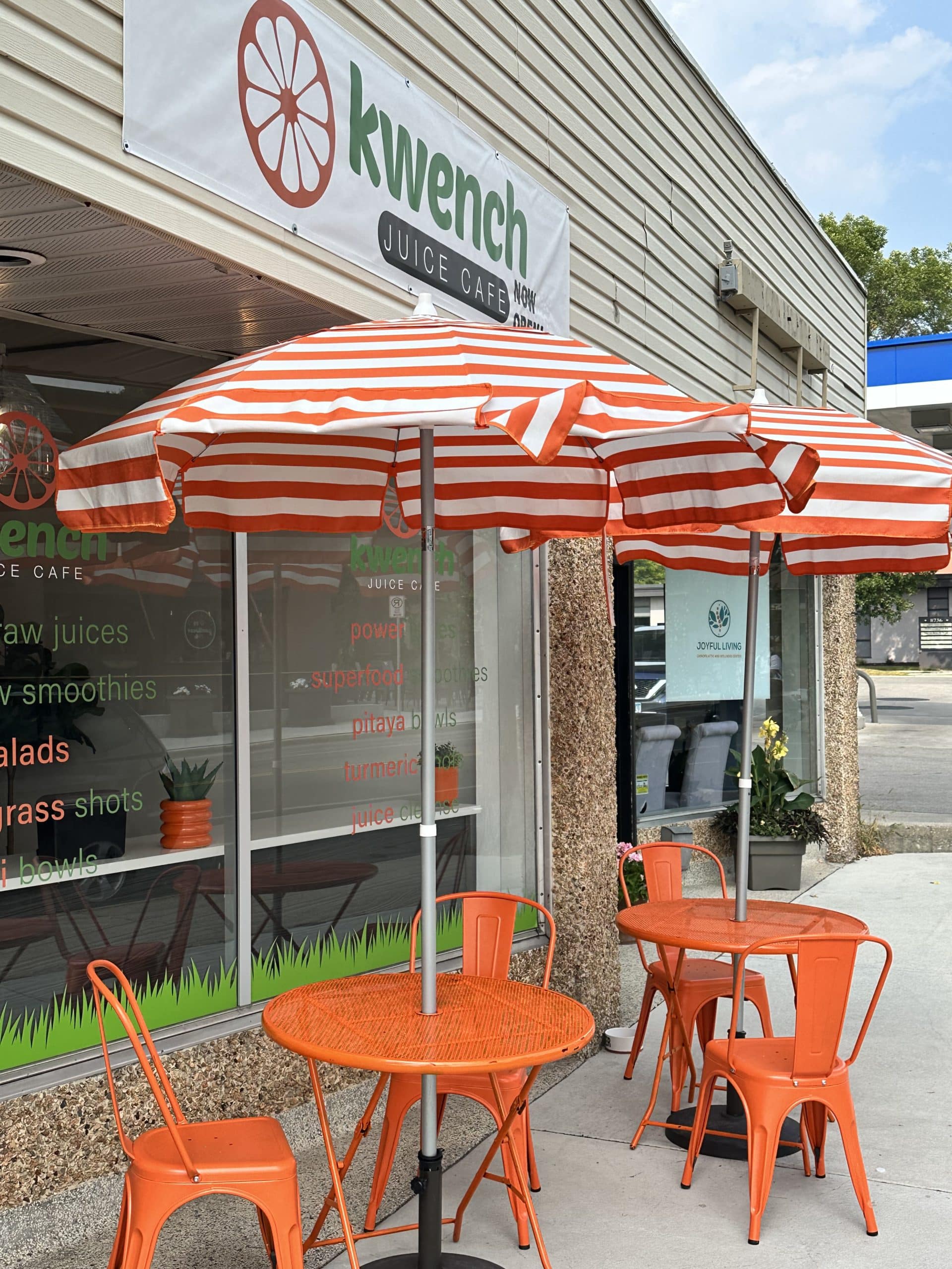 Orange table outside of Kwench Juice Cafe